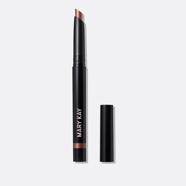 The Shimmer Eye Shadow Stick in shade Radiant Bronze stands on a white background with the cap off, clearly showing the slanted tip and shade.